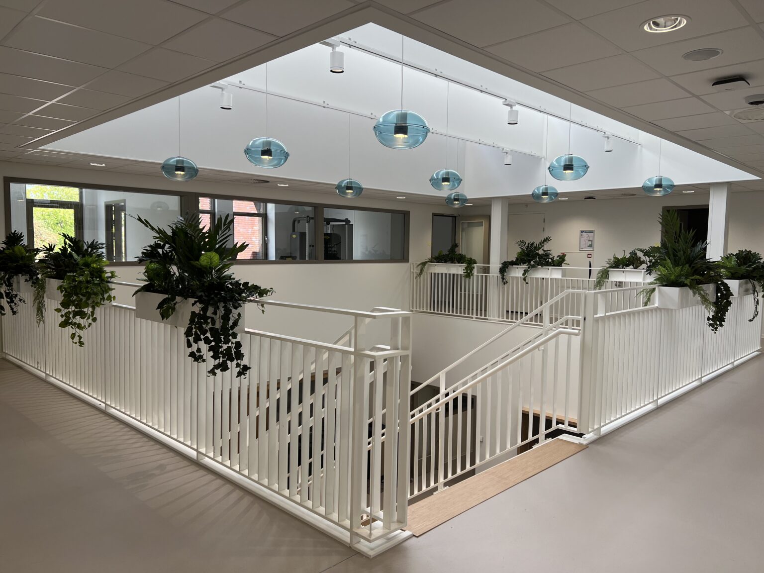 Yulius Drechtster realisatie interieur school entree lampen